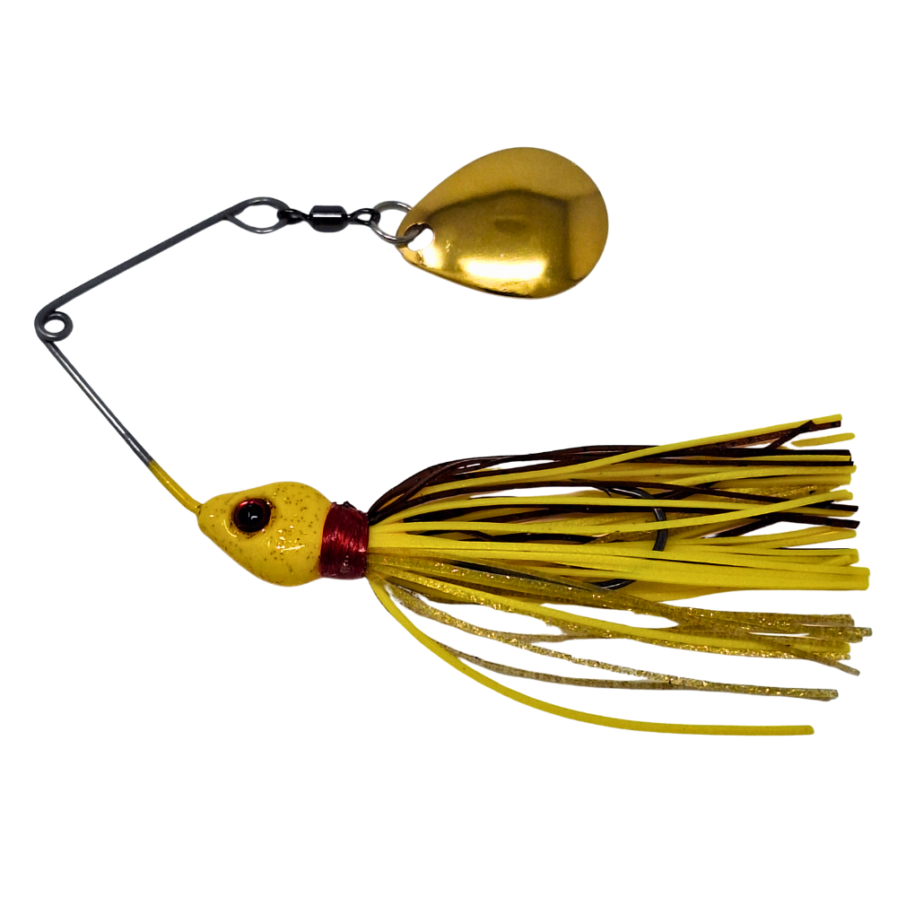 Fishing lure with gold blade and yellow and black skirt on a white background
